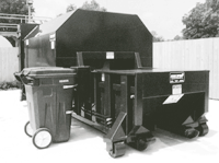 Container dumper on self-contained