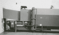 Rear feed security chute